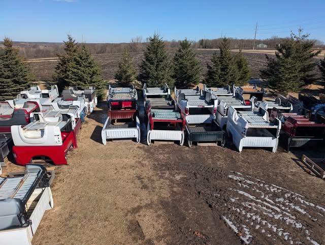 American Truck Beds lot with hundreds of truck beds in stock